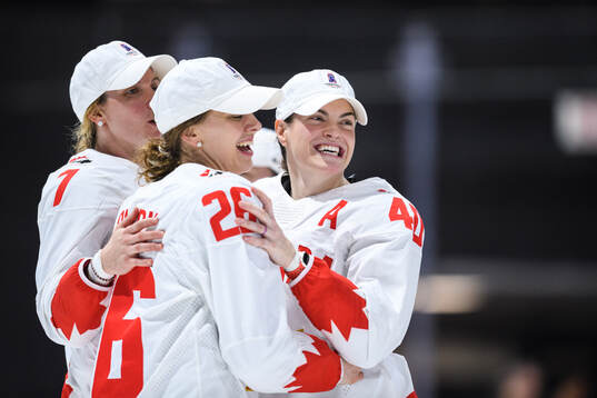 Laura Stacey, Emily Clark and Blayre Turnbull of Canada