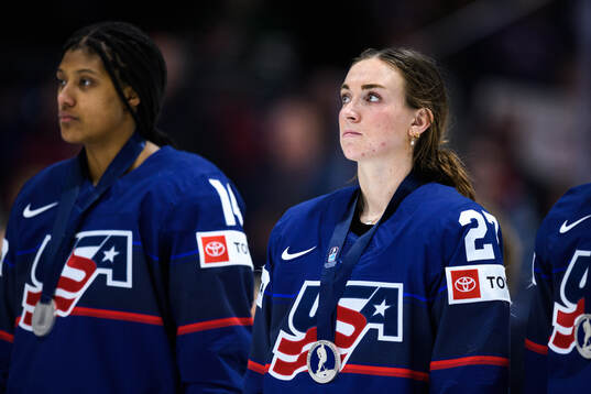 Taylor Heise of USA looks dejected