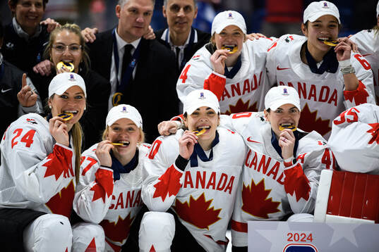 Players of Canada celebrate
