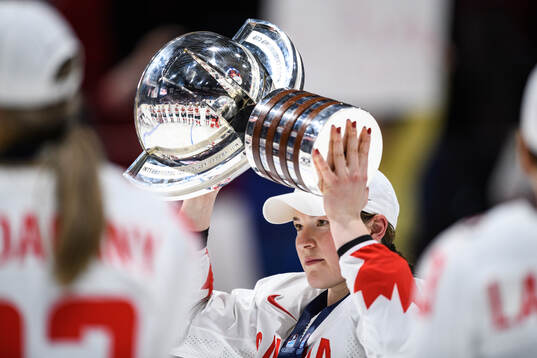 Ella Shelton of Canada celebrates
