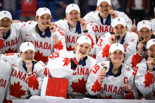 Players of Canada celebrate