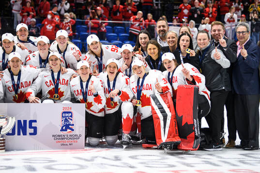 Players of Canada celebrate