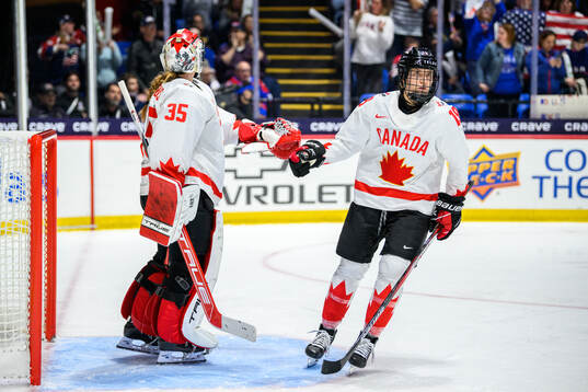 Goaltender Ann-Renee Desbiens and Brianne Jenner of Canada
