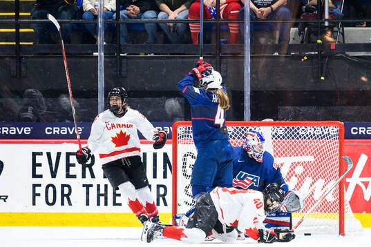 Emily Clark of Canada celebrates scoring 4-4