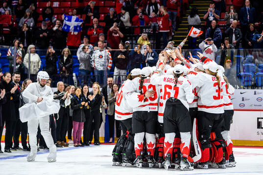 Players of Canada celebrate