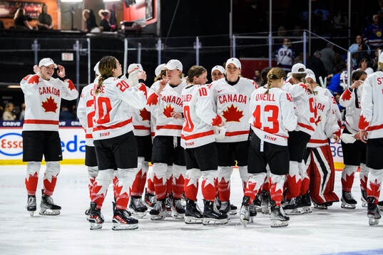 Players of Canada celebrate
