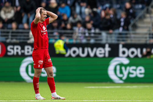 Fredrik Pallesen Knudsen of Brann looks dejected