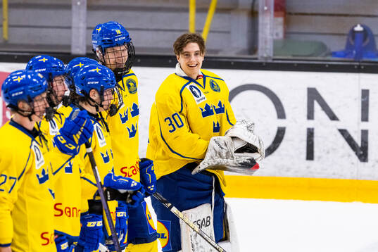 Goaltender Isak Sörqvist of Sweden celebrates
