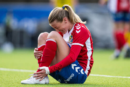 Kristin Holmen of Lyn in pain