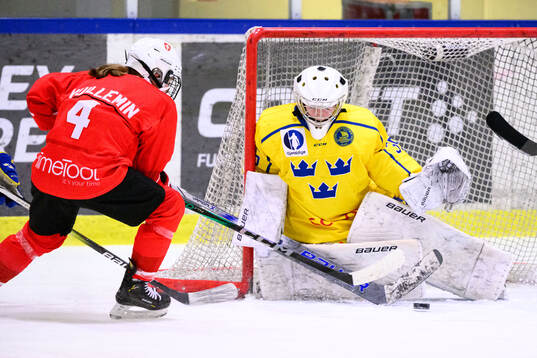 Aiyana Vuillemin of Switzerland and Goalkeeper Tilde