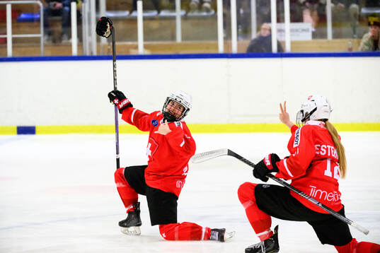 Lorie Besson-Lou of Switzerland celebrates