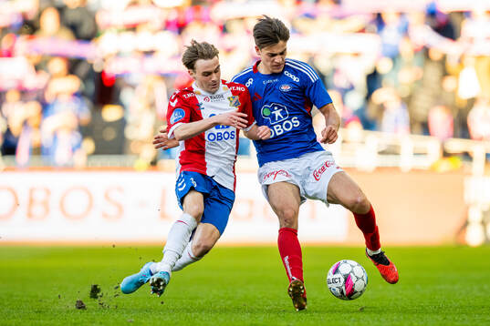 Tobias Myhre of Lyn and Magnus Bech Riisnæs of Vålerenga