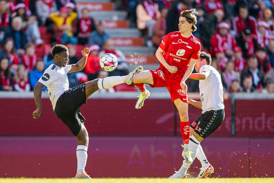 Tony Miettinen of Odd and Ulrik Mathisen of Brann