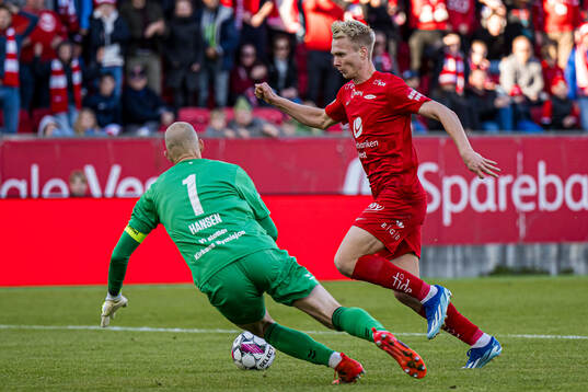 Andre Hansen of Odd and Magnus Warming of Brann
