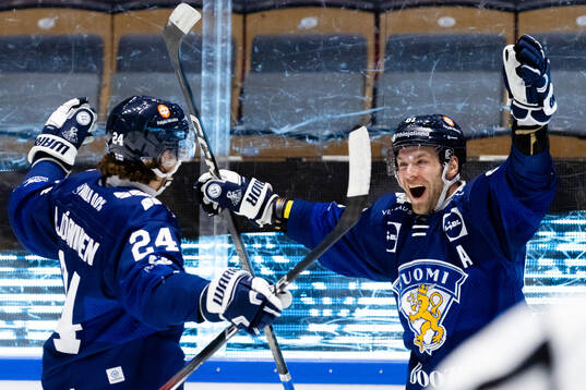 Hannes Björninen and Liro Pakarinen of Finland celebrate
