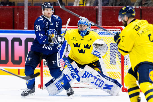 Liro Pakarinen of Finland and goalkeeper Filip Larsson of