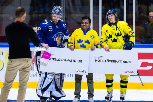 Goaltender Harri Säteri of Finland and Marcus Sörensen of