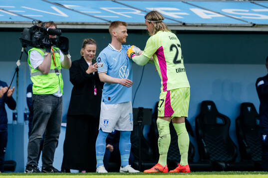 Malmö FFs Anders Christiansen och målvakt Johan Dahlin