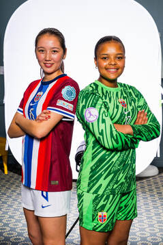 Henny Thorallsson and Goalkeeper Maria Kroken of the