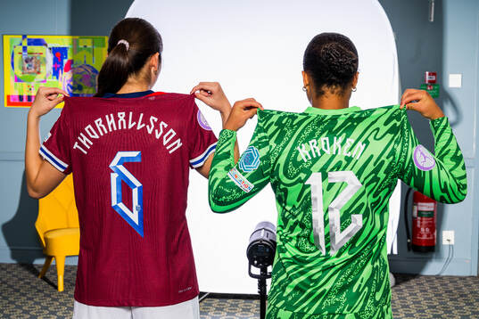 Henny Thorallsson and Goalkeeper Maria Kroken of the