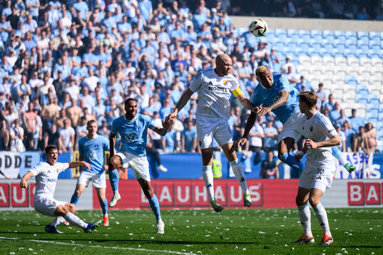 Djurgårdens Marcus Danielson och Malmö FFs Derek Cornelius
