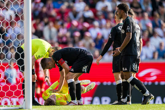 Sander Tangvik of Rosenborg with an injury