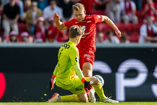 Sander Tangvik of Rosenborg and Aune Heggebø of Brann