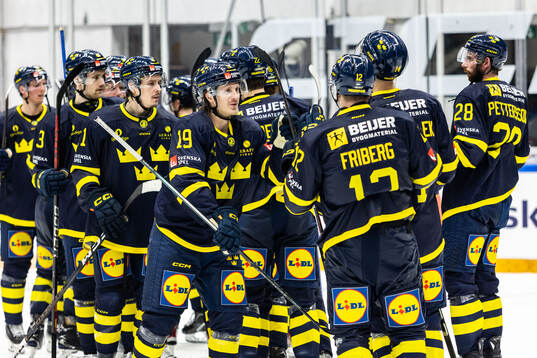 Players of Sweden celebrate