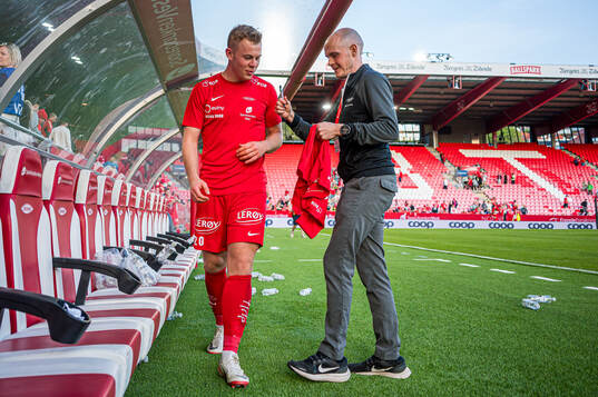 Aune Heggebø of Brann and Thomas Brakstad, press officer