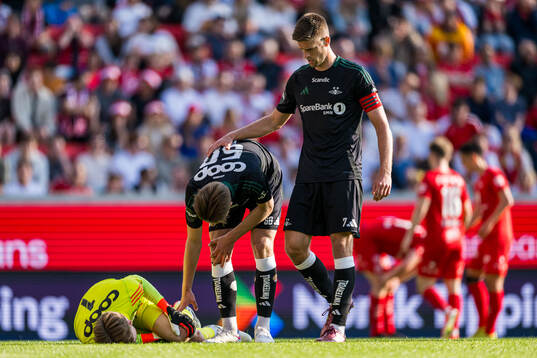 Sander Tangvik of Rosenborg with an injury