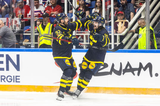 Linus Johansson of Sweden celebrates with Patrik Nemeth