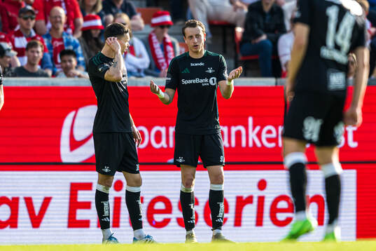 Ole Selnæs and Ole Sæter of Rosenborg looks dejected