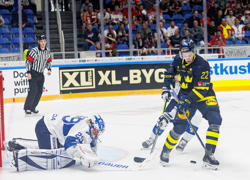 Lukas Vejdemo of Sweden against goaltender Harri Säteri of