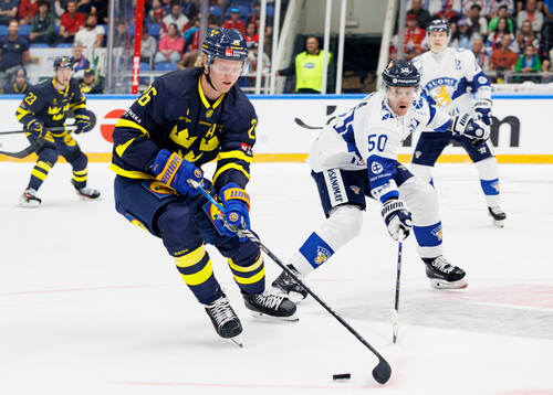 Rasmus Dahlin of Sweden and Juuso Riikola of Finland
