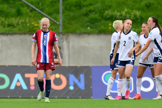 Linnea Holmesveen Moen of Norway looks dejected
