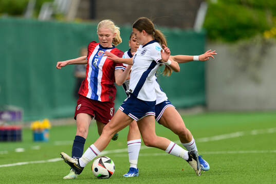 Linnea Holmesveen Moen of Norway against Omotara Junaid and
