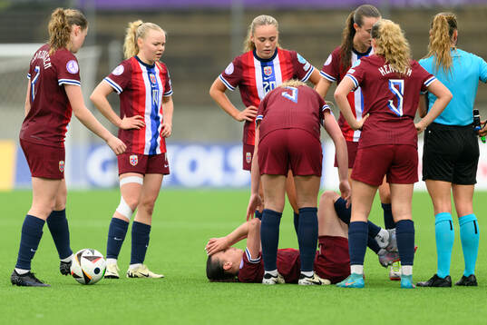 Nora Mjøs of Norway in pain