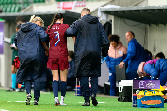 Nora Mjøs of Norway in pain