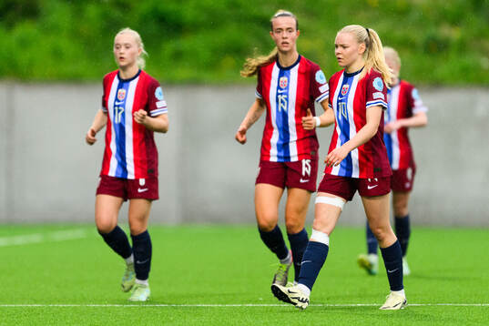And and Anny Kerim-Lindland of Norway looks dejected