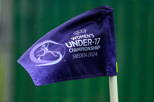 A corner flag with the logo of the UEFA women’s Under-17
