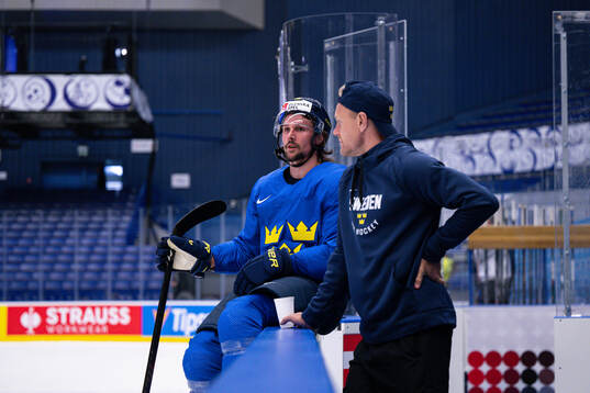 Erik Karlsson and assistant general manager Patric