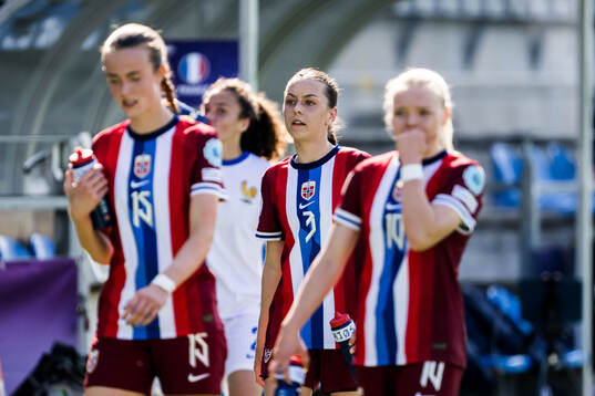 Nora Mjøs of Norway looks dejected