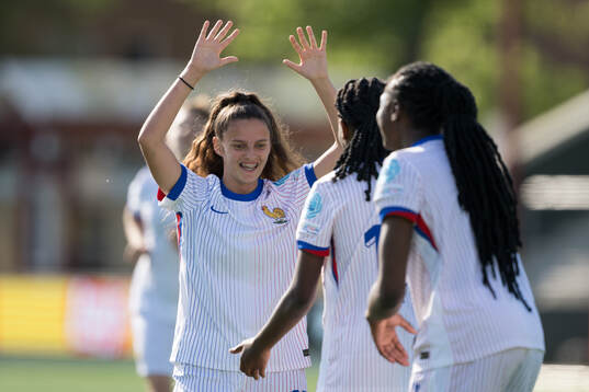 Léa Sylejmani and Djenna Léna Tene of France celebrate