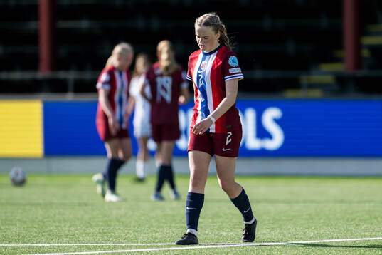 Ina Raaum Andreassen of Norway looks dejected