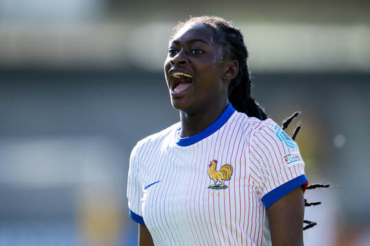 Rachael Abedini of France celebrates