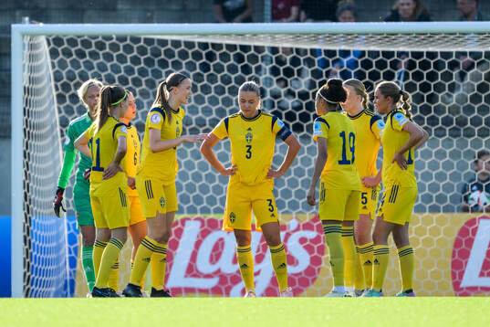 Wilma Ceder and Alice Broman of Sweden look dejected