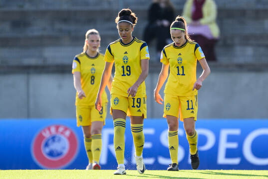 Felicia Schröder and Augusta Priks of Sweden look dejected