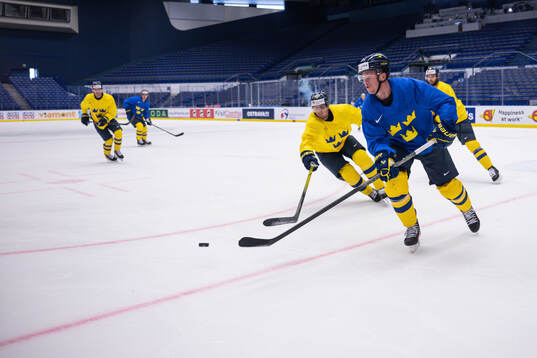 Isac Lundeström and Lucas Raymond of Sweden at a practice