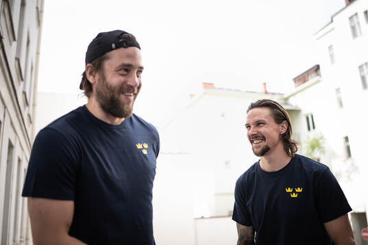 Victor Hedman and Erik Karlsson at a press event with Sweden