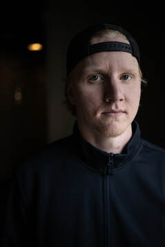 Rasmus Dahlin poses for a portrait at a press event with